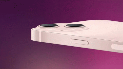 A Close Up Of A White Iphone With Two Cameras On A Purple Background . GIF