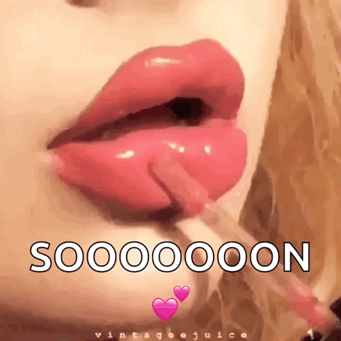 A Close Up Of A Woman Applying Lip Gloss With The Words Sooooooon Written On The Bottom GIF