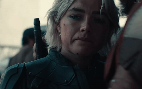 Woman Holding Gun With Kepler Text GIF