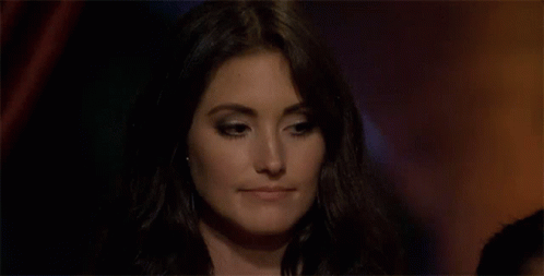 A Close Up Of A Woman Making A Funny Face . GIF