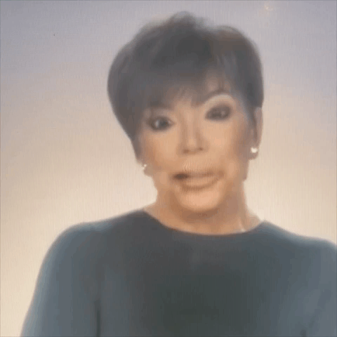 A Close Up Of A Woman Making A Funny Face GIF