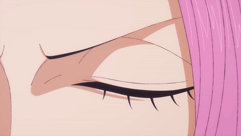 A Close Up Of A Woman 'S Eye With A Purple Pupil GIF