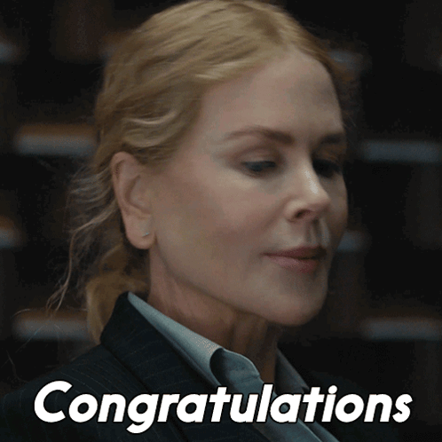 A Close Up Of A Woman 'S Face And The Words Congratulations GIF