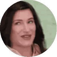 a close up of a woman 's face in a circle on a white background .