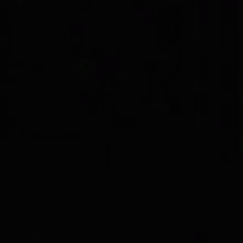 a close up of a woman 's face in the dark .