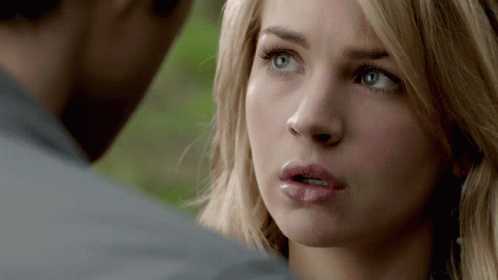 Close Up Woman's Face Looking At Man GIF