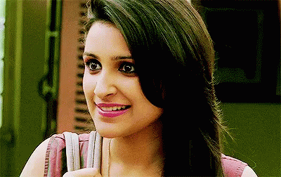 A Close Up Of A Woman 'S Face With A Backpack On Her Shoulder . GIF