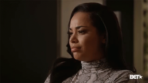 A Close Up Of A Woman 'S Face With A Bet Logo On The Bottom GIF