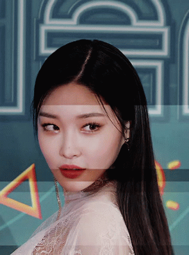 A Close Up Of A Woman 'S Face With A Blurry Background And The Word Jc On It GIF
