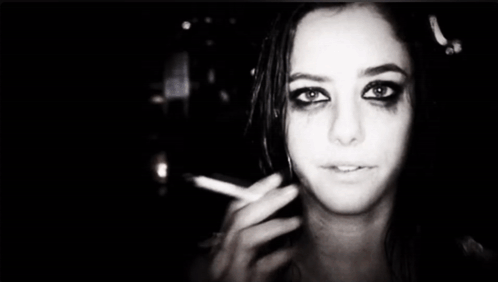 Close Up Of Woman's Face With Blurry Background GIF