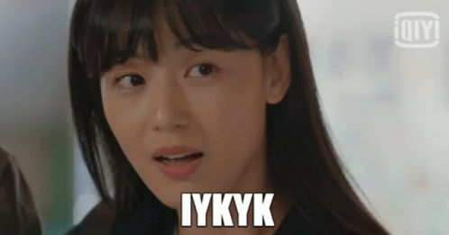 A Close Up Of A Woman 'S Face With A Caption That Says Iykyk . GIF