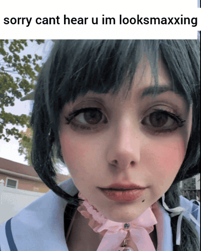 A Close Up Of A Woman 'S Face With A Caption That Says Sorry Cant Hear U Im Looksmaxxing GIF