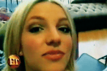 Close Up Of Woman's Face With ET Logo GIF