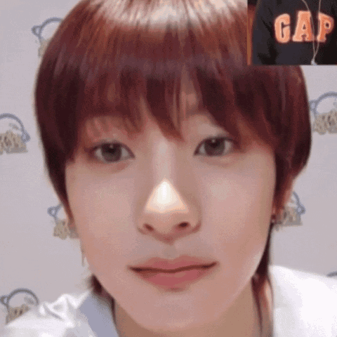 Close Up Of Woman's Face With Gap Hoodie Background GIF
