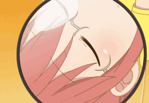 A Close Up Of A Woman 'S Face With A Magnifying Glass GIF