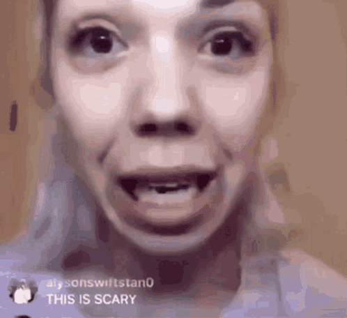 a close up of a woman 's face with a missing tooth and a caption that says `` this is scary '' .