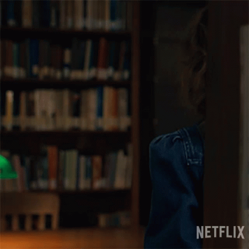A Close Up Of A Woman 'S Face With A Netflix Logo In The Corner GIF