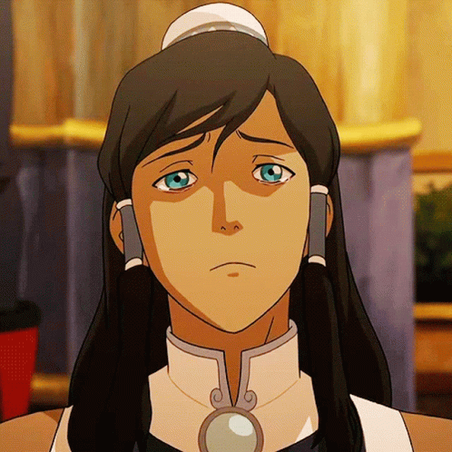 A Close Up Of A Woman 'S Face With A Sad Look On Her Face GIF