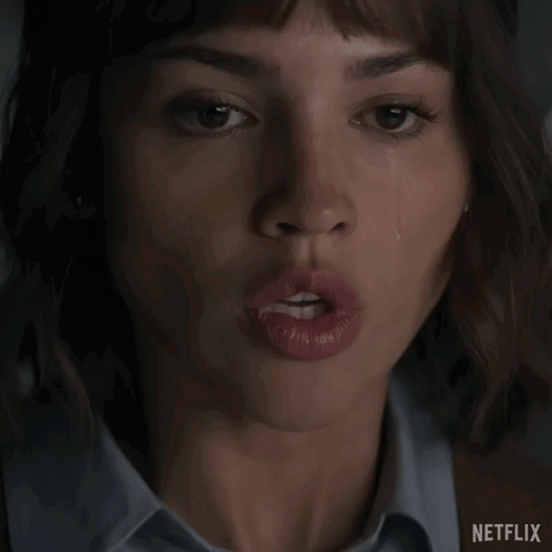 Woman's Face With Tear From Nose GIF