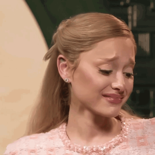 A Close Up Of A Woman 'S Face With A Tear Running Down Her Face GIF