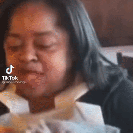 A Close Up Of A Woman 'S Face With A Tiktok Watermark On It . GIF