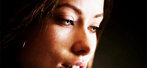 A Close Up Of A Woman 'S Face With A Tooth Missing GIF