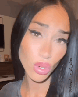 A Close Up Of A Woman 'S Face With A Watermark That Says ' Joteando ' On It GIF