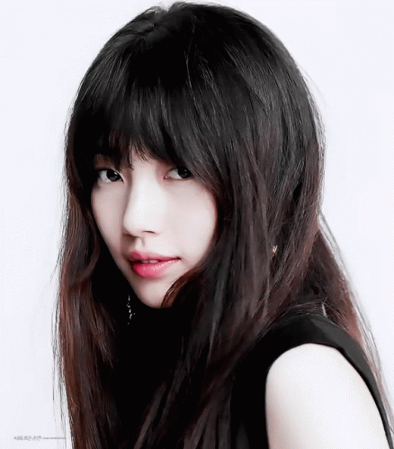 A Close Up Of A Woman 'S Face With A White Background And The Words ' Korean ' On The Bottom GIF