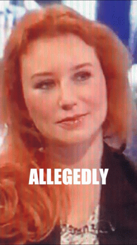 A Close Up Of A Woman 'S Face With Allegedly Written In White GIF