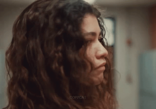 A Close Up Of A Woman 'S Face With Copycat Written On The Bottom Right GIF
