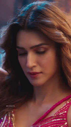 A Close Up Of A Woman 'S Face With Dk Edits Written On The Bottom Right GIF