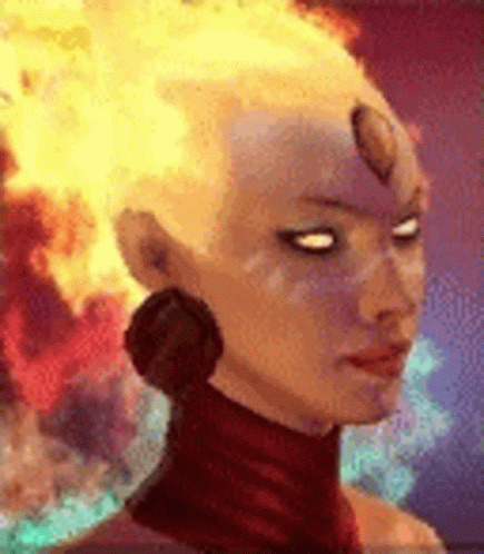 A Close Up Of A Woman 'S Face With Fire In Her Hair . GIF