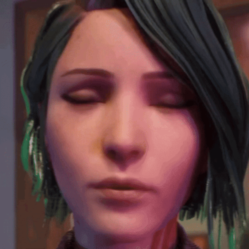 a close up of a woman 's face with green hair