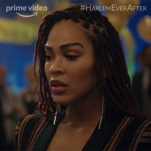 A Close Up Of A Woman 'S Face With #Harlem Ever After Written On The Bottom GIF