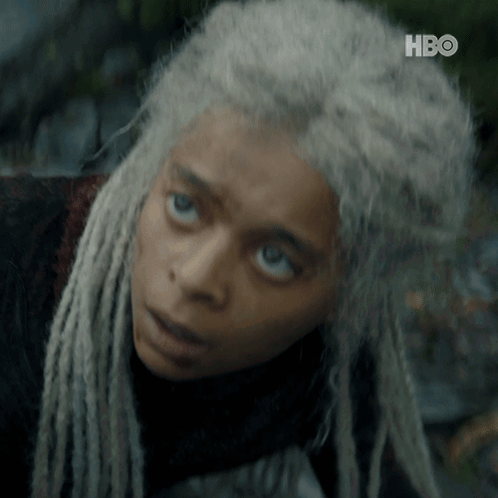 a close up of a woman 's face with hbo written on the bottom