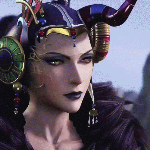 A Close Up Of A Woman 'S Face With Horns On Her Head GIF