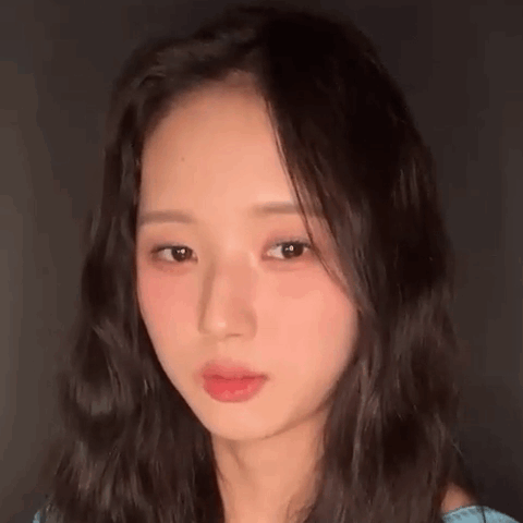 Woman With Long Hair And Blue Shirt GIF