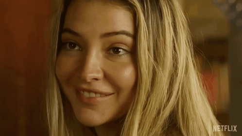 a close up of a woman 's face with netflix written in the corner