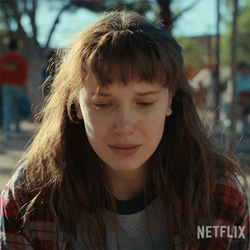 A Close Up Of A Woman 'S Face With Netflix Written On The Bottom GIF