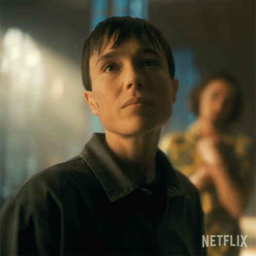 A Close Up Of A Woman 'S Face With Netflix Written On The Bottom GIF