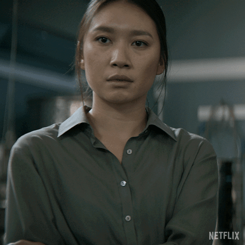 A Close Up Of A Woman 'S Face With Netflix Written On The Bottom GIF