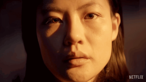 Close Up Of Woman's Face With Netflix Text GIF