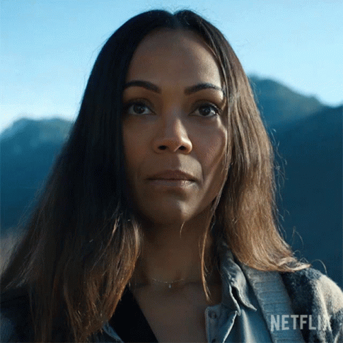 A Close Up Of A Woman 'S Face With Netflix Written On The Bottom Right GIF