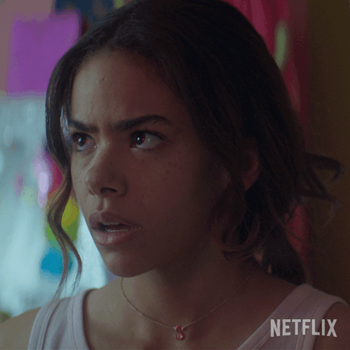 A Close Up Of A Woman 'S Face With Netflix Written On The Bottom GIF