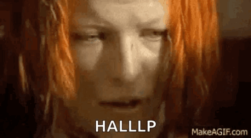 A Close Up Of A Woman 'S Face With Orange Hair And The Words Hallp Written On It . GIF