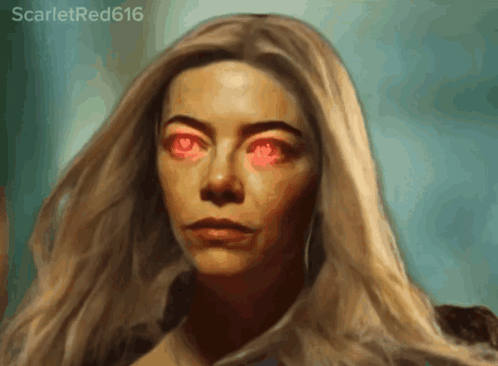 a close up of a woman 's face with scarletred616 written on the bottom