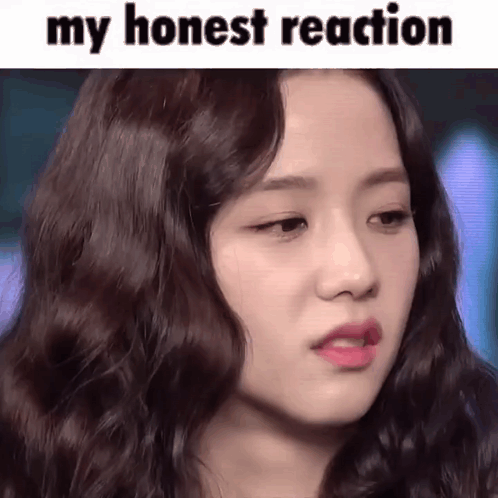 A Close Up Of A Woman 'S Face With The Caption `` My Honest Reaction '' . GIF