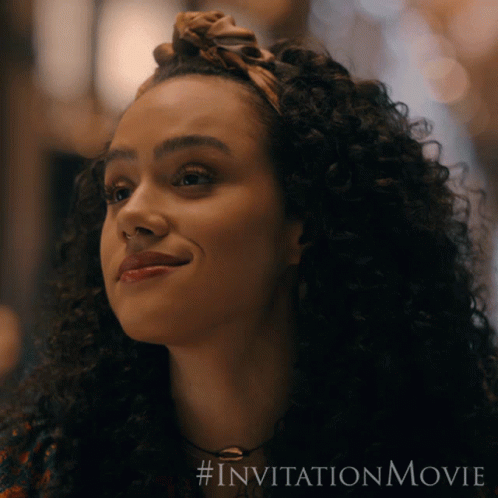 A Close Up Of A Woman 'S Face With The Invitation Movie Written Below Her GIF