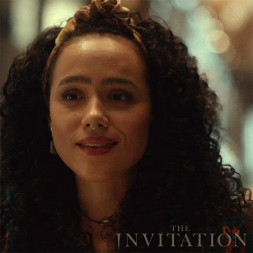 A Close Up Of A Woman 'S Face With The Invitation Written On The Bottom Right GIF