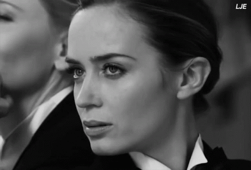 A Close Up Of A Woman 'S Face With The Letters Lje Below Her GIF